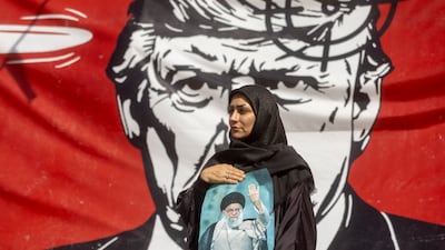 Images at the Grand Mosalla in Tehran of Iran's slain supreme leader Ayatollah Ali Khamenei and US President Donald Trump represent the rival philosophies at play, Getty Images