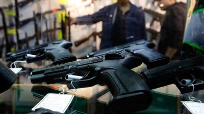 Handguns are displayed during the 45th edition of the Arms Trade Fair in Lucerne on March 29, 2019. AFP