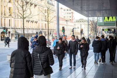People walk in Stockholm amid the coronavirus outbreak. Reuters