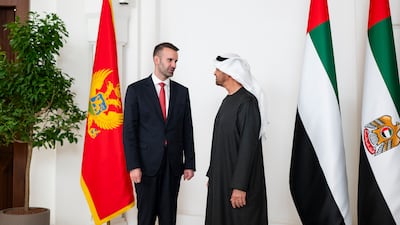 President Sheikh Mohamed with Milojko Spajic, Prime Minister of Montenegro, after a memorandum of understanding exchange during a meeting at Al Shati Palace