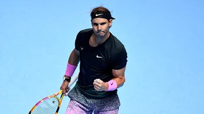 Rafael Nadal reacts after winning a point. Reuters