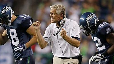 Pete Carroll, the Seattle Seahawks head coach, shouts out encouragement to his players during Saturday night's pre-season friendly triumph over the Tennessee Titans.