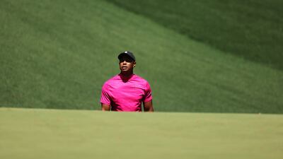 Tiger Woods watches his ball on the 10th hole. EPA
