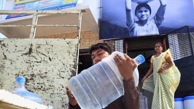 Promodini Jhamble runs the filtered water shop provided by Eureka Forbes to supply filtered drinking water to the rural population at village Viratnagar near Solapur. Subhash Sharma for The National