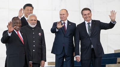 From left, South Africa's President Cyril Ramaphosa, China's President Xi Jinping, India's Prime Minister Narendra Modi, Russia's President Vladimir Putin and Jair Bolsonaro, Brazil's president at the time, attend the 2019 Brics summit in Brasilia. AP