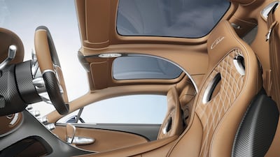 The panels filter out harmful ultraviolet radiation, improve the roof's stiffness and extends headroom. Bugatti Automobiles SAS