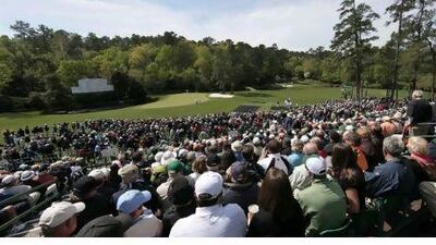 Crowds have gatherd in droves to watch the world's top golfers practise at Augusta National this week. Charlie Riedel / AP Photo
