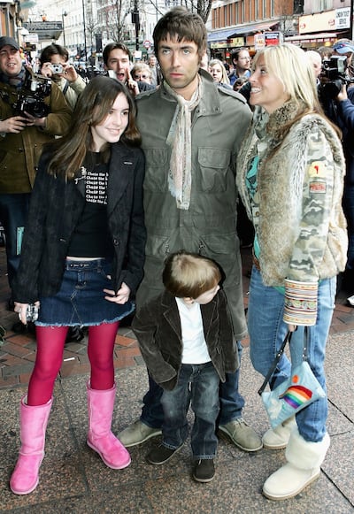 Gallagher with Nicole Appleton, his partner at the time, and two of his children. Getty