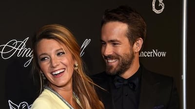 Blake Lively and Ryan Reynolds. Dimitrios Kambouris / Getty Images for Gabrielle's Angel Foundation / AFP