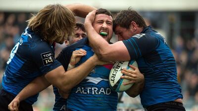 Montpellier's Mickael Ivaldi celebrates a try with teammates during their Top 14 win over Racing 92 on Saturday. Bertrand Langlois / AFP / March 19, 2016