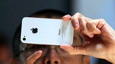 Neither Etisalat nor du elaborated on the suspension of iMessage service. Getty Images / AFP