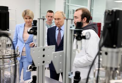Russian President Vladimir Putin visits a laboratory at Sirius University of Science and Technology, in the Russian Black Sea city of Sochi. EPA