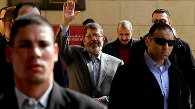 ohammed Morsi, yesterday presided over a shake-up of the cabinet, replacing 10 of the 36 ministers as his government