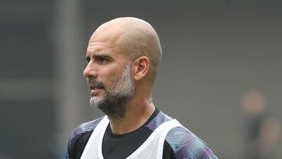 Pep Guardiola looks on during training. Getty