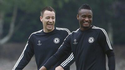 Chelsea captain John Terry and John Obi Mikel attend a training session for Chelsea on Tuesday. Eddie Keogh / Reuters / April 29, 2014