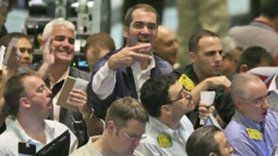 Traders work the crude oil futures pit at the New York Mercantile Exchange on Oct 16 2008.