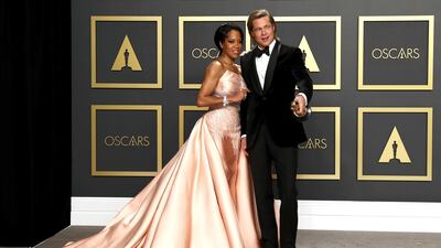 Brad Pitt poses in the press room with Regina King with the Oscar for Best Supporting Actor at the 92nd Academy Awards on Sunday, February 9. EPA