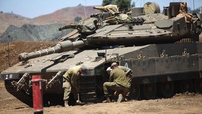 Israeli soldiers in the Golan Heights. Jalaa Marey / AFP