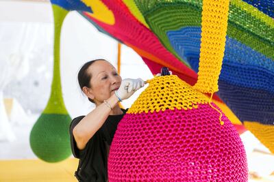 Toshiko creates nets made out of 800-1,000 kilos of nylon and weaves them into beautiful and inspiring art installations that are entirely interactive. Reem Mohammed / The National