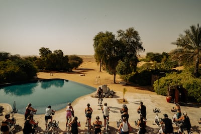 Crank and Al Maha, a Luxury Collection Desert Resort & Spa have teamed up for sunrise cycling classes during Dubai Fitness Challenge. Photo: Crank