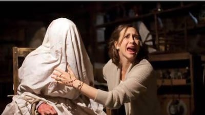 Vera Farmiga, right, as Lorraine Warren in a scene from The Conjuring. Michael Tackett / New Line Cinema / Warner Bros Pictures / AP Photo
