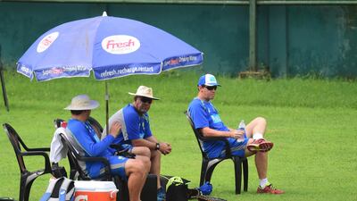 Darren Lehmann, centre, the Australia coach, has had plenty to think over since his side lost the first Test to Bangladesh. Munir Uz Zaman / AFP