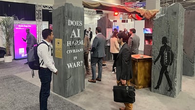 At the AI+ convention in Washington, a booth for the International Committee for the Red Cross stands in sharp contrast to the surrounding booths consisting of defence contractors and technology giants. Photo: Cody Combs