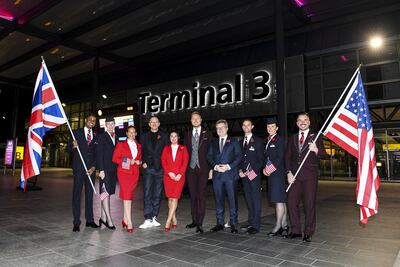 Sean Doyle, British Airways chairman and chief executive (fourth right), and Shai Weiss, Virgin Atlantic chief executive (fourth left), at London Heathrow Airport on Monday. PA