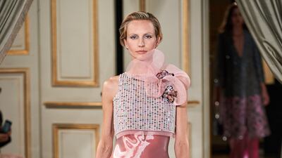 Dense beading tops this column dress by Armani Prive for haute couture autumn / winter 2021.