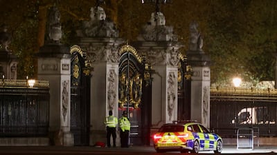 Police at the gates of Buckingham Palace after a man was arrested on Tuesday evening. Reuters