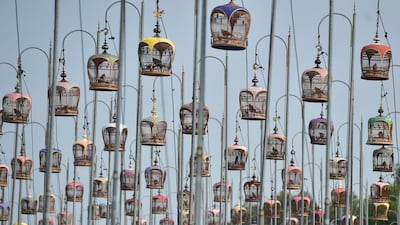 Zebra doves sit in cages during an annual bird singing competition in Thailand's southern Narathiwat province. AFP