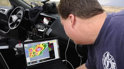 A broad tornado sliced through Little Rock’s suburbs Sunday, killing at least 11 people and leaving behind a miles-long path of destruction as a powerful system rumbling off the Plains provided a violent kick-start to the nation’s tornado season. Gene Blevins / Reuters