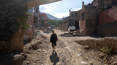A man passes along a road in Tnirte. Getty Images