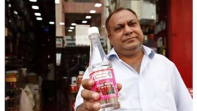 Laxman Tekchandani, the company's sales manager, says orders increase to more than 10,000 bottles for Ramadan.