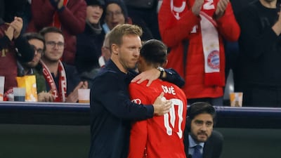 Bayern Munich's Leroy Sane with coach Julian Nagelsmann after he was substituted. Reuters