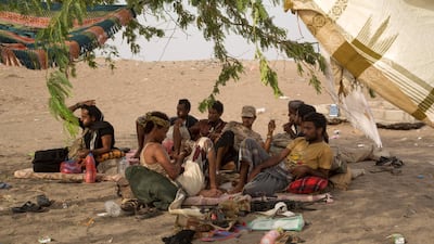Members of the Tihama brigades chew qat as they rest at the coastal front line. May16, 2018. Asmaa Waguih for The National