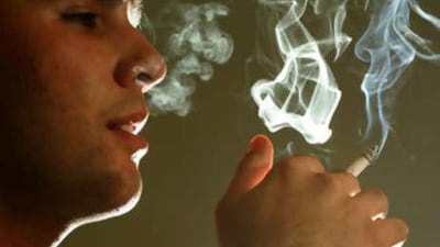 The ban on under-age smokers is a week old, but shop owners say implementing the regulation poses challenges.