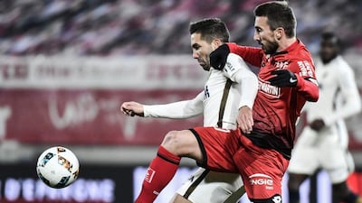 Dijon's Romain Amalfitano, right, vies with Monaco's Joao Moutinho during their match on Tuesday. Jeff Pachoud / AFP / November 29, 2016