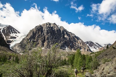 The Blue Lake is hidden in a scree-covered bowl on the far side of a huge glacier halfway up the side of the daunting 4km high Mt Aktru. It can reached during a day hike. Stuart Butler