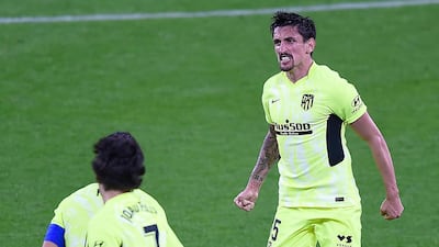Atletico Madrid's Montenegrin defender Stefan Savic celebrates after scoring the equaliser. AFP