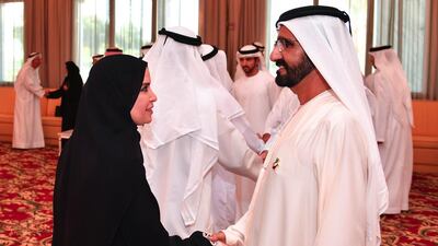 Sheikh Mohammed bin Rashid, Prime Minister and Ruler of Dubai, greets Dr Amal Al Qubaisi, President of the FNC, at the first Cabinet meeting of the year on Sunday in Dubai. Wam
