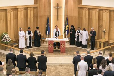 The Reverend Canon Andy Thompson leading a Remembrance Day service. Reem Mohammed / The National