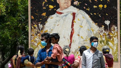 People visit a memorial for former prime minister Rajiv Gandhi in Sriperumbudur. AFP