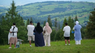 Tourists admire the view from atop Gubalowka hill
