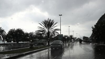 Rain has hit Khor Fakkan in Sharjah and other parts of the UAE's east coast. Pawan Singh / The National
