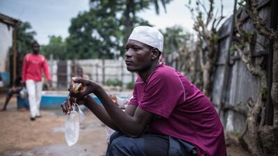 A Congolese Muslim waits for dusk to break the fast on the second day of Ramadan, in the mosque of Zongo on June 19, 2015. About 1500 Central African Republic (CAR) refugees live in this congolese city of Zongo, located near Bangui, after fleeing brutal inter-religious violence in 2013-2014. Federico Scoppa / AFP photo