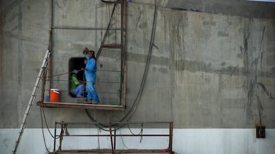 Workers on the bridge on October 24, 2010. Lee Hoagland/ The National
