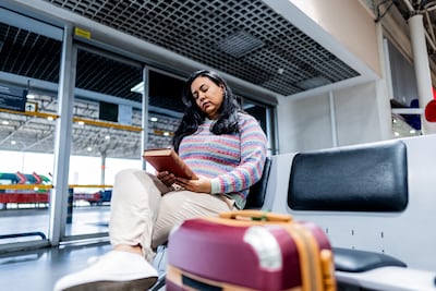 Keep a book for your on-the-go bag to inspire you to read instead of doomscroll. Getty Images