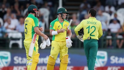 Australia's David Warner, centre, made a memorable return to Newlands. Reuters