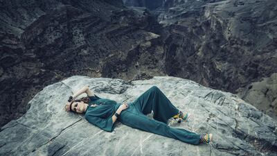 THE EDGE OF REASON: Photography: Roc Chaliand; Fashion director: Sarah Maisey; Styling: Hafsa Lodi Jumpsuit, Dh1,577, Endemage. Heels, price on request, Miu Miu. Cuffs, Dh1,285 each, Marni. Brooch, Dh2,350, Versace. Rings, Dh380 each; necklace, Dh1,100, all from D by Dalia